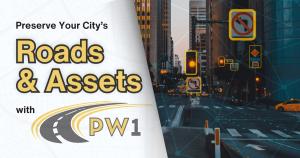 Text on image displays "Preserve your roads & assets with PublicWorks1". Photo to the right shows a city street, highlighting traffic signs and lights.